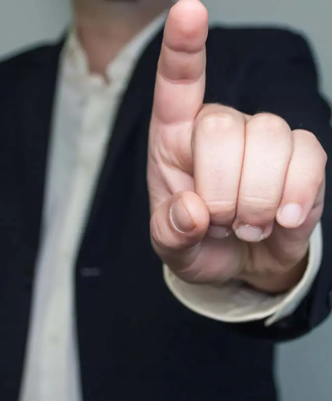 A-businessman-in-a-suit-pointing-his-finger