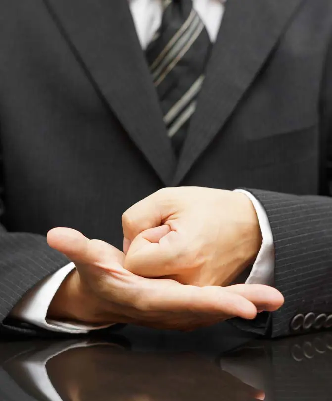 A-businessman-is-making-a-fist-during-a-meeting