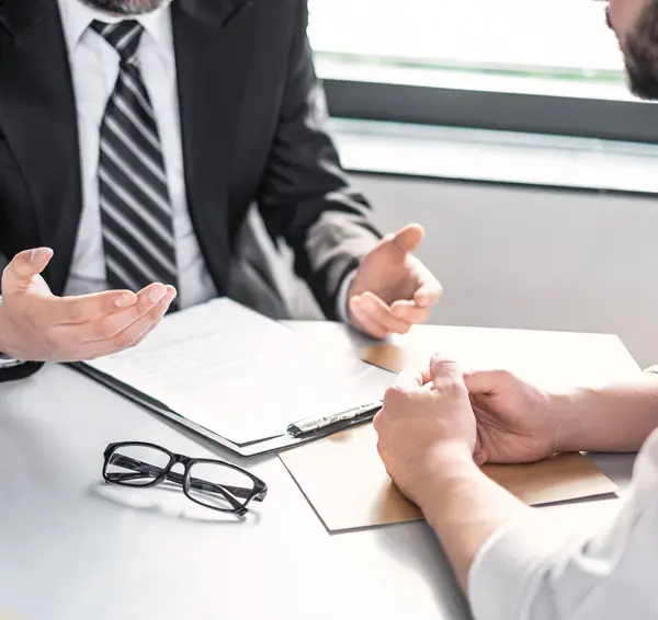 Business-people-discussing-a-contract