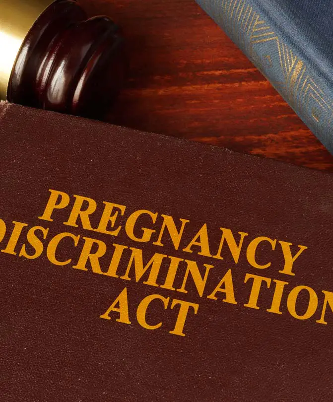 Closeup-of-a-book-with-the-title-The-Pregnancy-Discrimination-Act