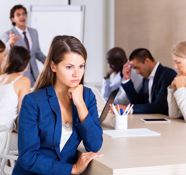 Business-woman-in-meeting-with-colleagues Business-woman-in-meeting-with-colleagues