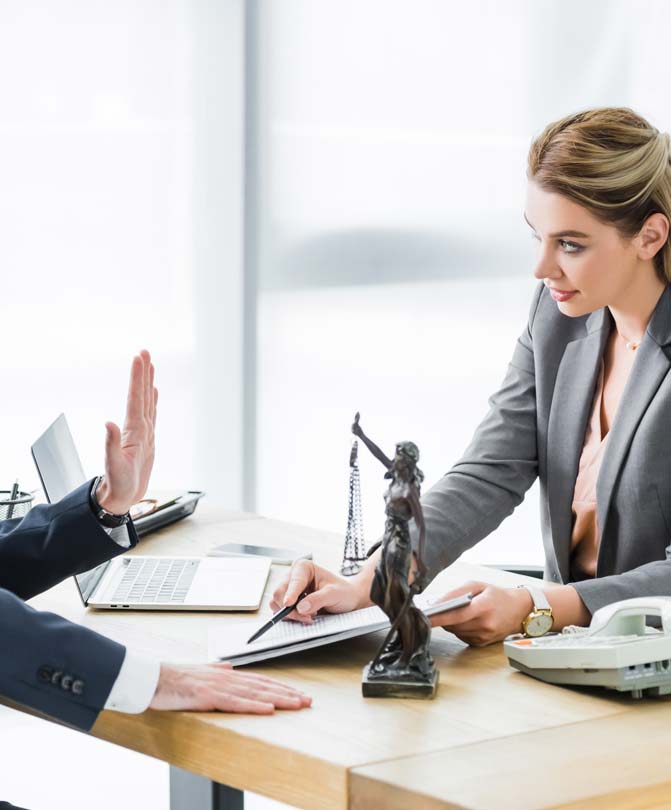 Businessman-looking-at-a-lawyer-holding-a-contract Businessman-looking-at-a-lawyer-holding-a-contract