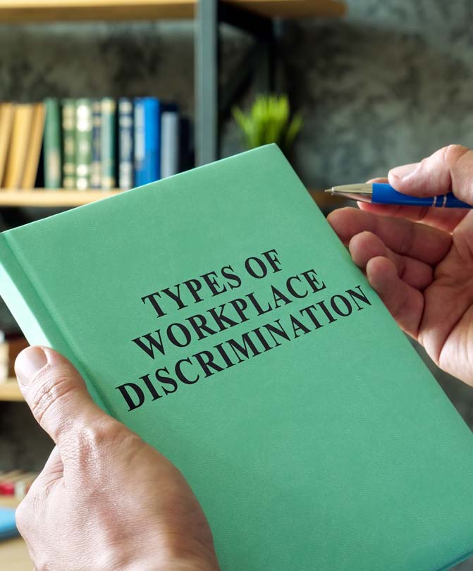 Image containing a book on types of workplace discrimination Image containing a book on types of workplace discrimination