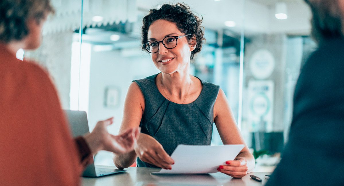 attorney-explaining-options-to-couple-during-consultation