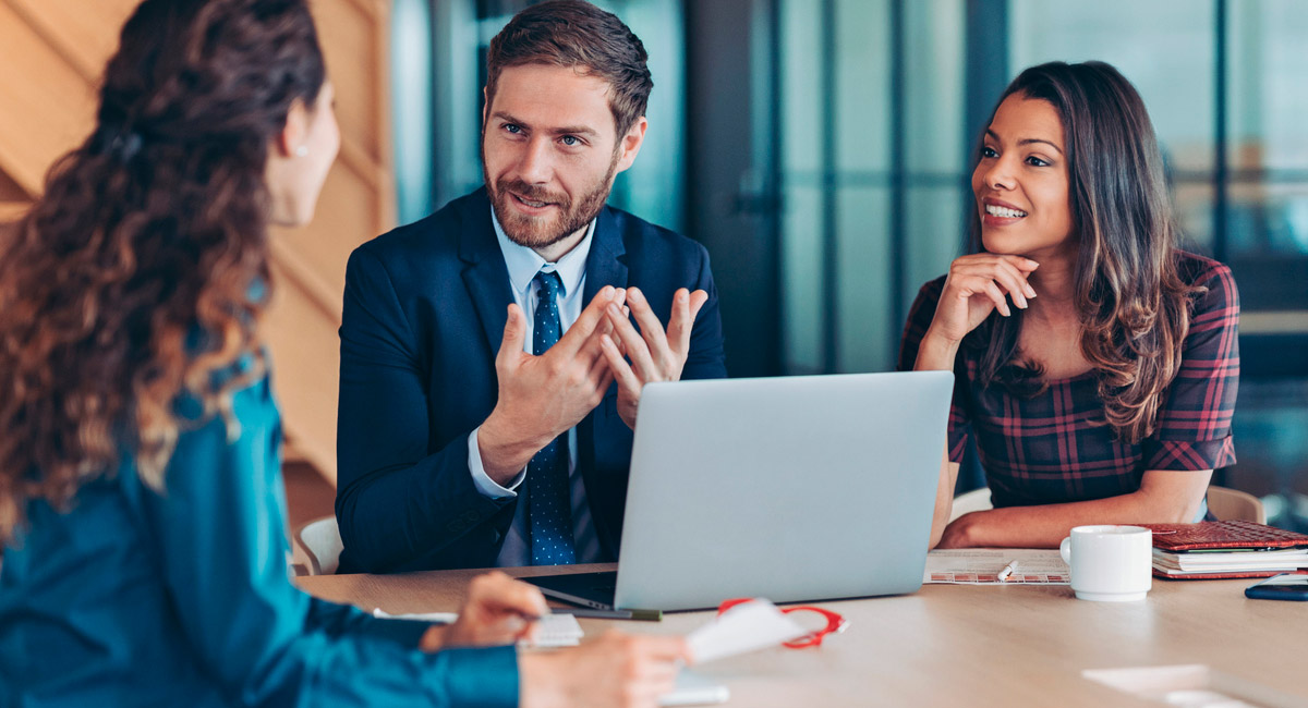 attorneys-discussing-case-at-conference-table