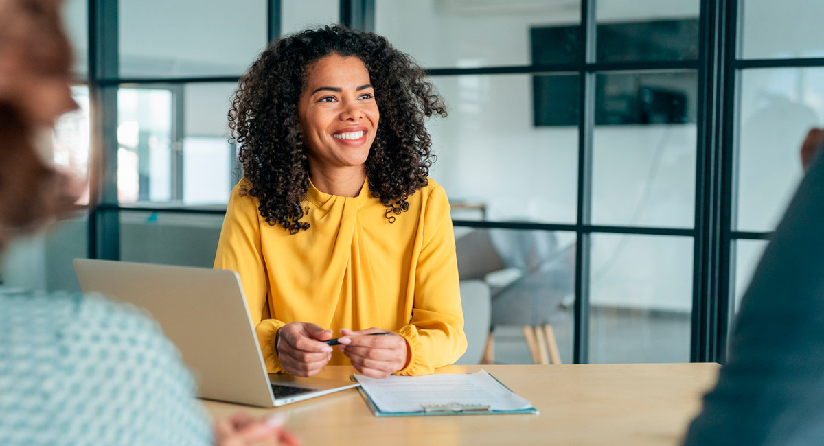 smiling-attorney-in-meeting-with-legal-team