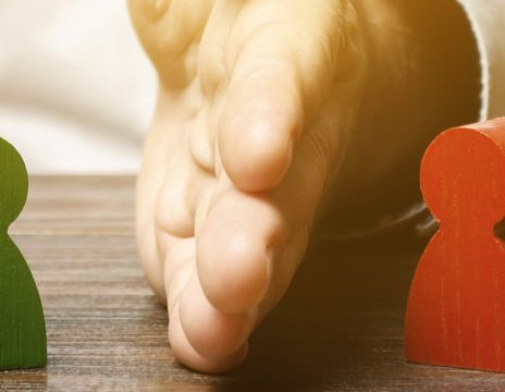 A-hand-illustrating-the-concept-of-conflict-resolution