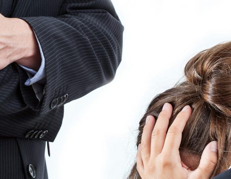 Boss-behaving-badly-with-a-female-worker-in-the-office