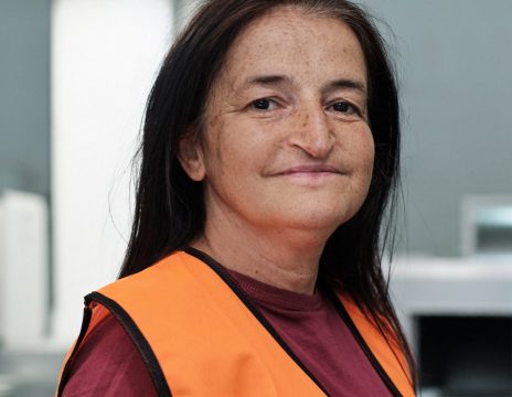 Front-view-of-a-worker-wearing-an-orange-vest