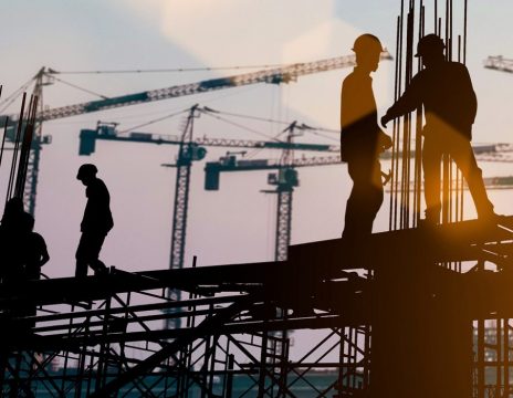 Silhouette-of-engineer-and-construction-team-working-at-site