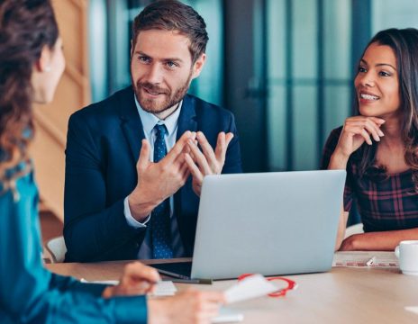 attorneys discussing case at conference table