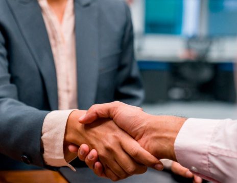 client shaking lawyer's hand