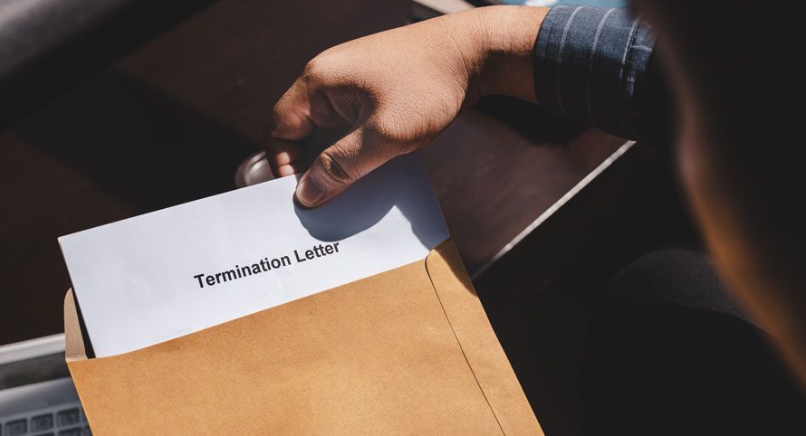 person-receiving-a-termination-letter-in-an-envelope