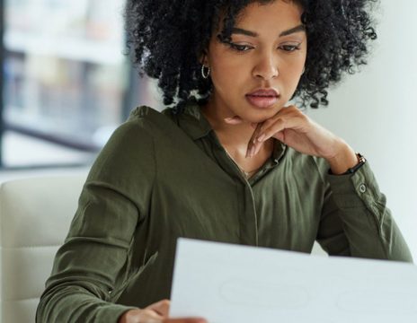 woman-working-at-a-laptop-in-a-bright-office